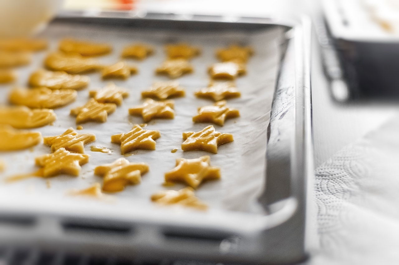 Star cookie dough shapes on a tray